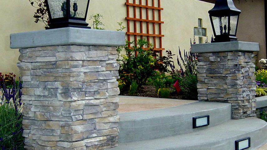 Masonry (Pre cast stone veneer columns with Poured in place caps and steps).jpg