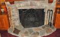Masonry (Pre cast stone veneer Indoor Fireplace with wood mantle).jpg