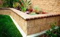 Masonry (Splitface Block wall and raised planter with Bull Nose brick cap).jpg
